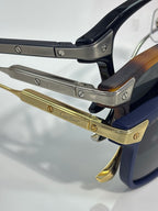 Cartier eyeglasses close-up of gold hinges and printed metal arms