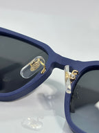 Cartier blue acetate eyeglasses with gold logo detail and clear lenses