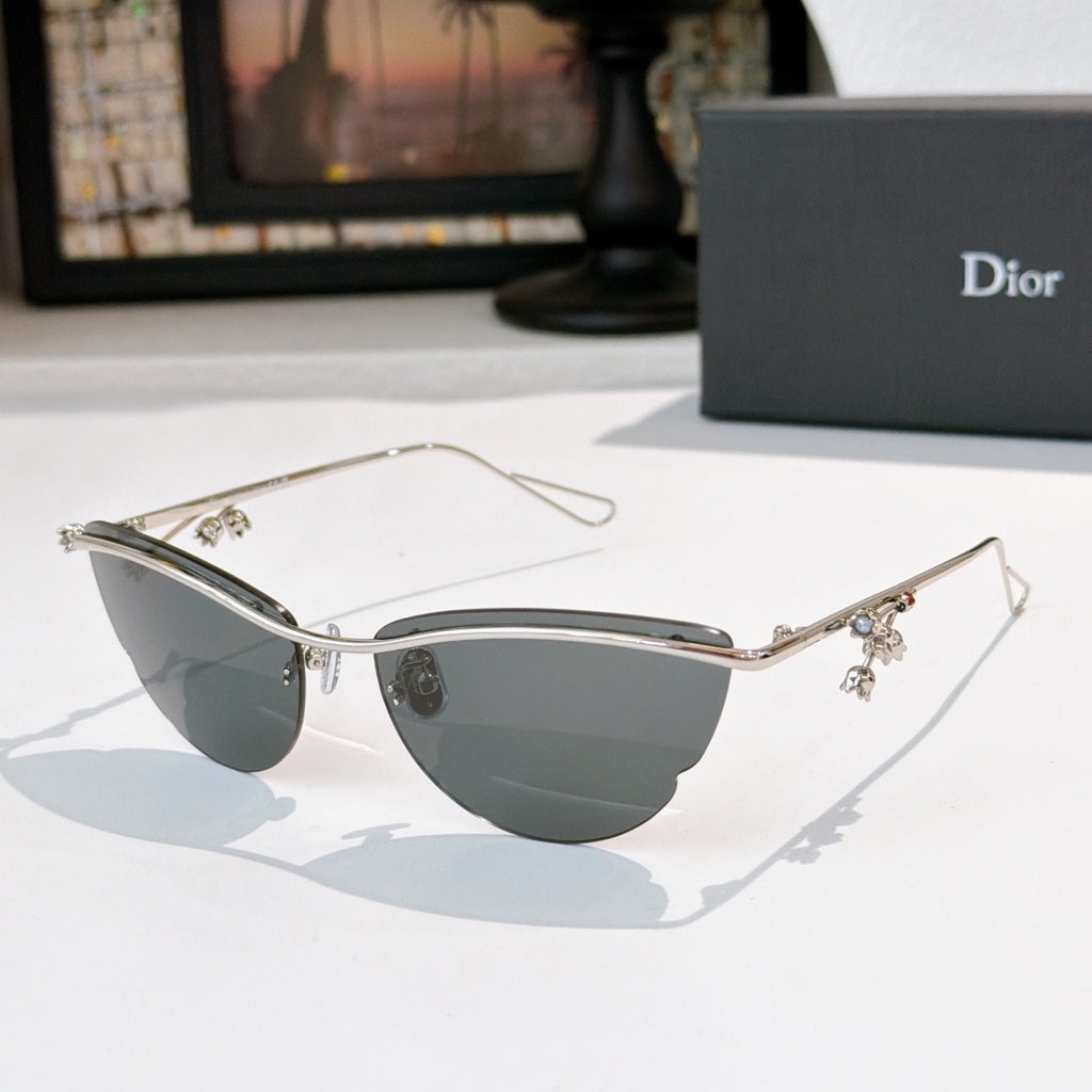 Dior sunglasses with silver frame and dark tinted lenses