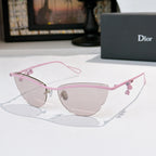 Dior sunglasses with pink frame and light tinted lenses, with floral charm details