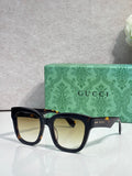 Gucci dark tortoiseshell square sunglasses with pale lenses and black temples