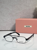 Black eyeglasses with clear lenses and black temple arms, metal frame with logo plate