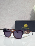 Versace sunglasses with dark acetate frame and tortoiseshell-brown temples, logo on arm.