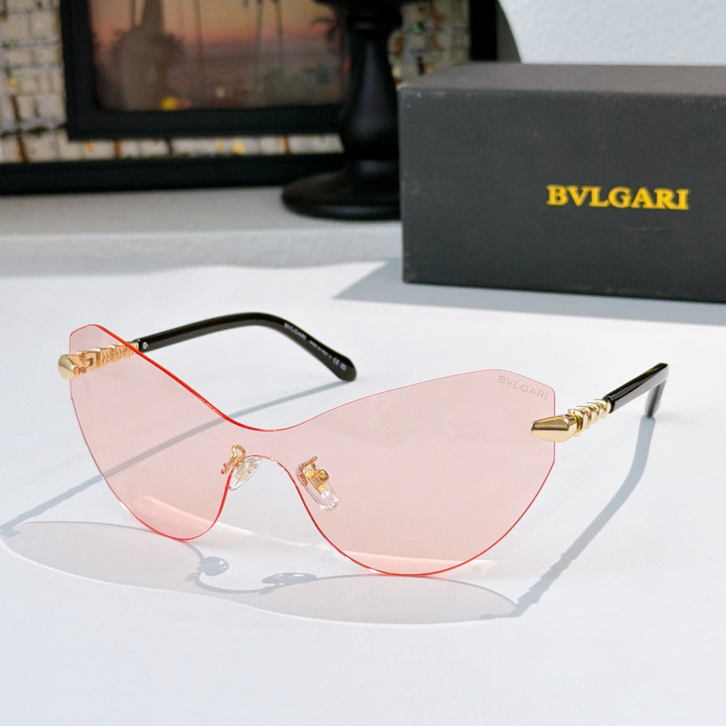 Bvlgari cat-eye sunglasses with dark frame and pink gradient lenses, gold accents