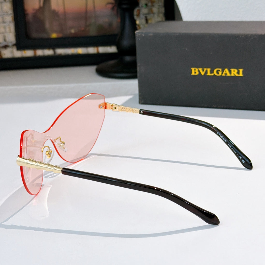 Bvlgari cat-eye sunglasses with black frame and pink-tinted lenses, gold details