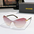 Bvlgari cat-eye sunglasses with pink lenses and dark frame, gold bridge and hinges