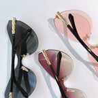 Bvlgari cat-eye sunglasses assortment: black-lens pair and pink-lens pair, gold hardware