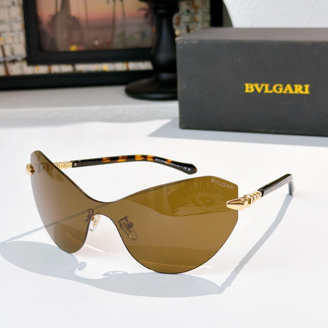 Bvlgari cat-eye sunglasses with tortoise arms and amber-tinted lenses, gold accents