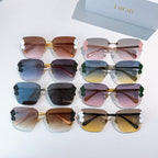 Set of Dior sunglasses with floral temple accents, mixed frames and lens colors.
