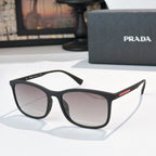 Prada black sunglasses with gradient dark lenses and curved full-frame design