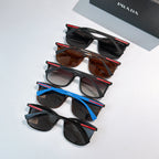 Prada sunglasses assortment with black, brown, and blue frames, stacked for display