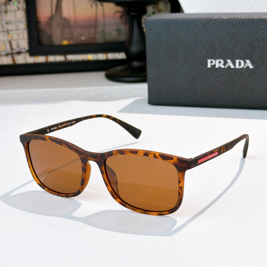 Prada tortoiseshell sunglasses with amber-brown lenses and full-frame shape