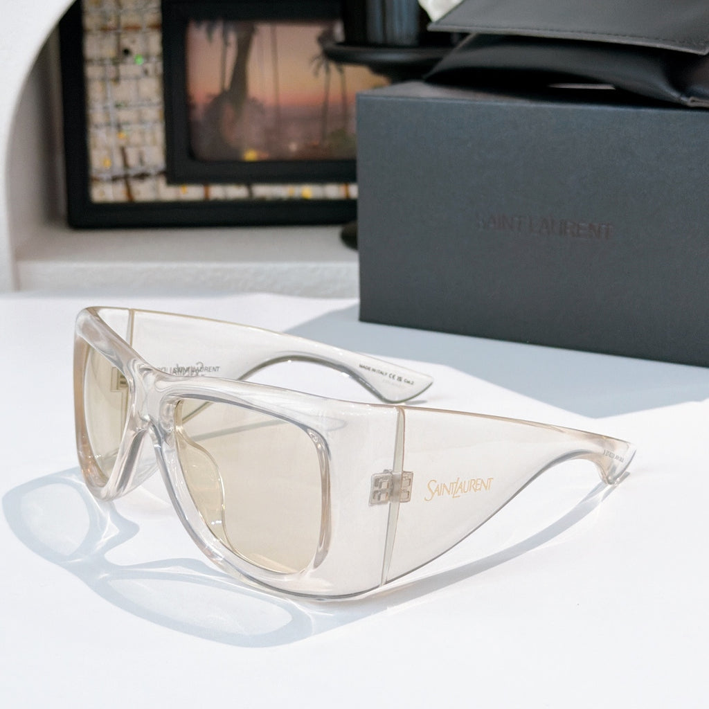 YSL sunglasses with clear frame and neutral tinted lenses