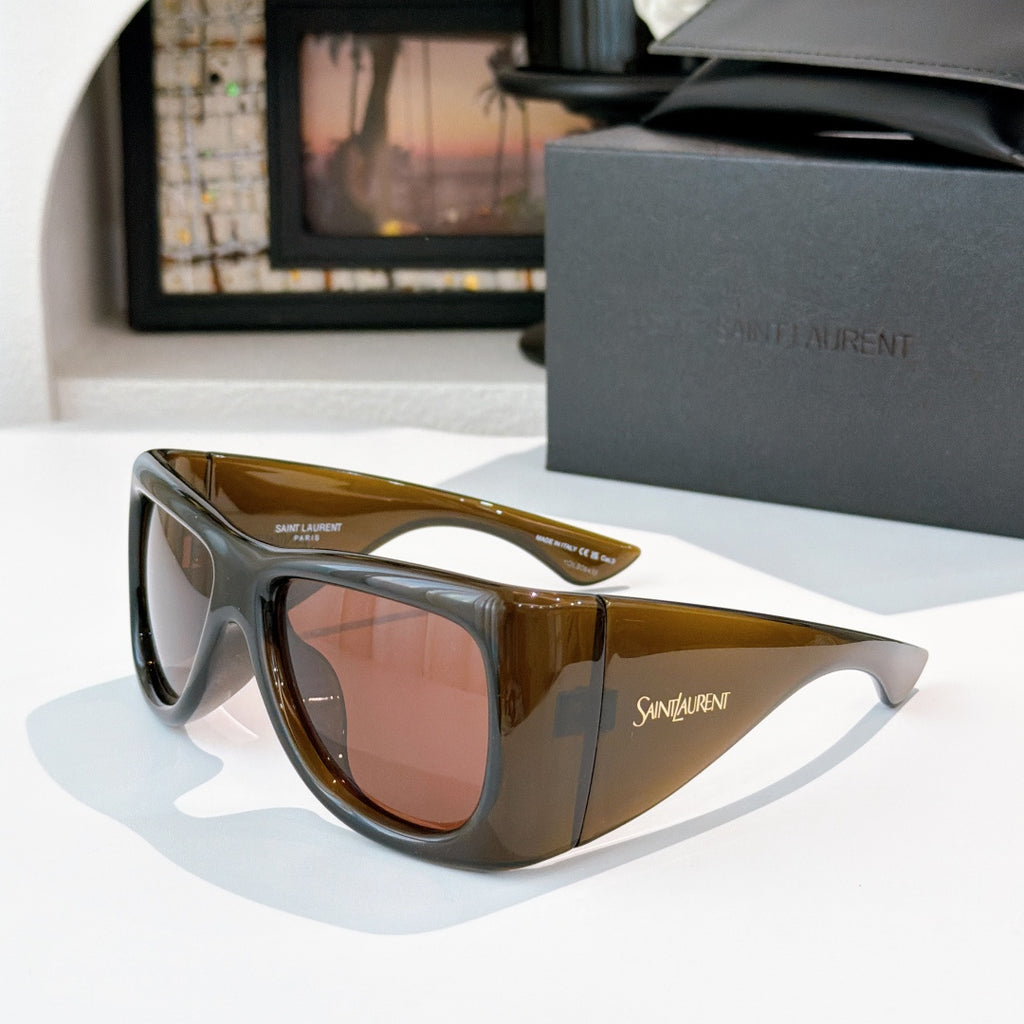 YSL sunglasses with dark brown frame and warm tinted lenses