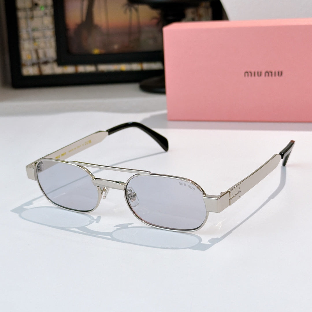 Sunglasses with silver frame, light gray lenses, and black temple tips.