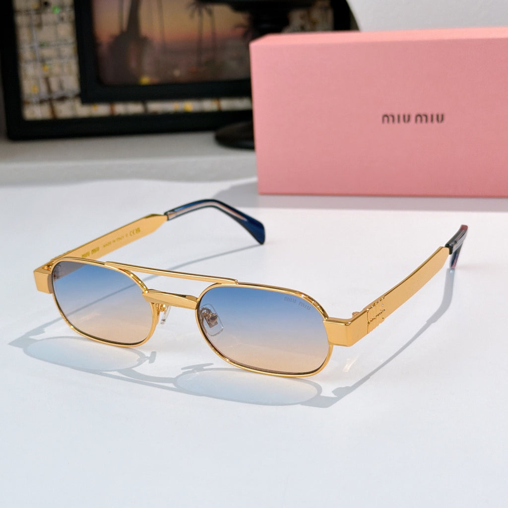 Sunglasses with gold frame, blue-tinted lenses, and dark blue temple tips.