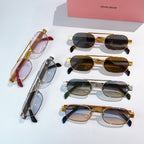 Sunglasses set with mixed frames—gold, silver, and dark colors—with tinted lenses.