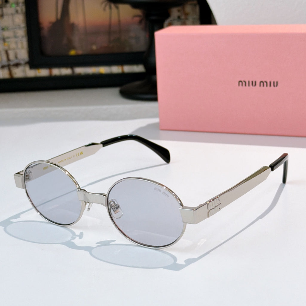 MiuMiu round sunglasses with silver frame, clear lenses, dark arms