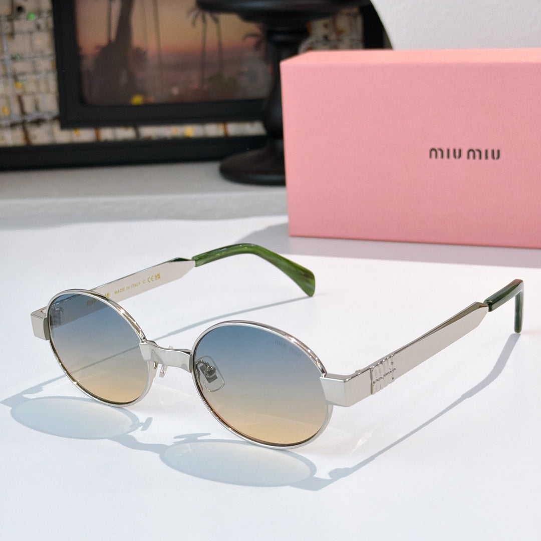 MiuMiu round sunglasses with silver frame, blue mirrored lenses, green arms