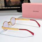 MiuMiu round sunglasses with gold frame and red arms, light lenses (side view)