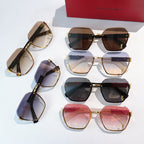 Set of designer sunglasses in multiple styles with gold frames and tinted lenses