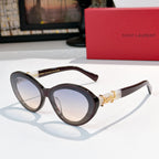 Dark brown oval sunglasses with gold Saint Laurent logo bridge and tinted lenses