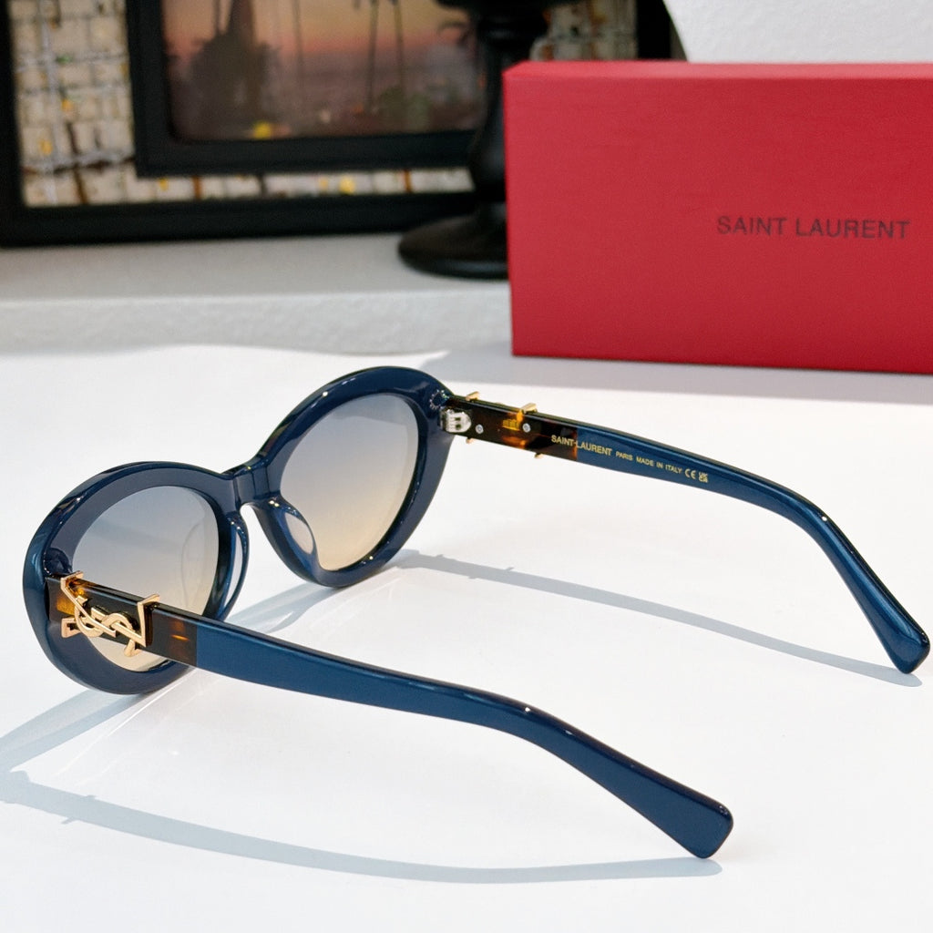 Blue oval sunglasses side view with gold Saint Laurent logo bridge detail