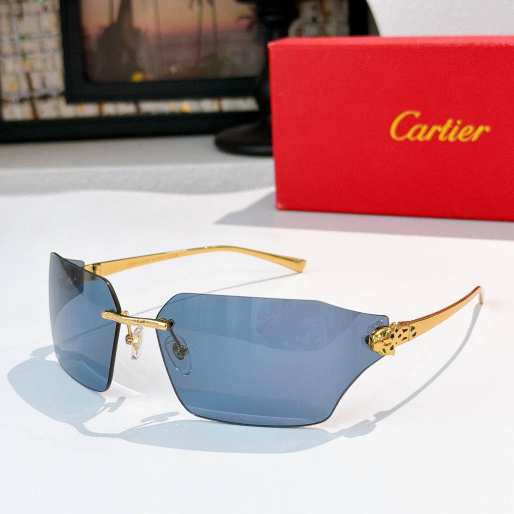 Cartier sunglasses with blue-tinted lenses and gold-tone frame, leopard-style temple accents