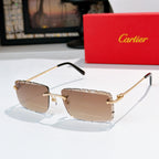 Sunglasses with warm brown tinted lenses, gold frame, and black temple tips.