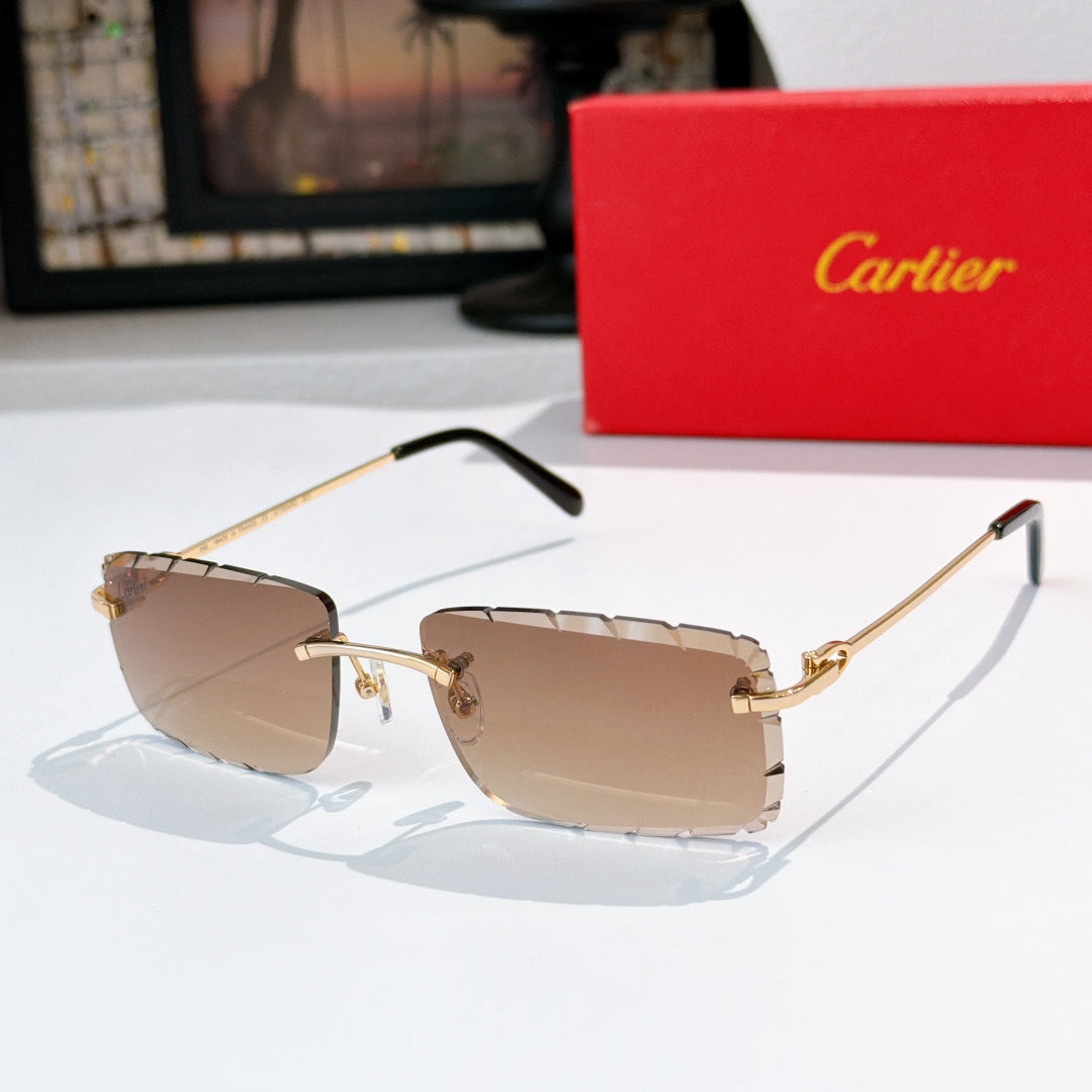 Sunglasses with warm brown tinted lenses, gold frame, and black temple tips.