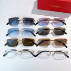 Assorted sunglasses display with gold frames and tinted lenses in blue, pink, and brown.