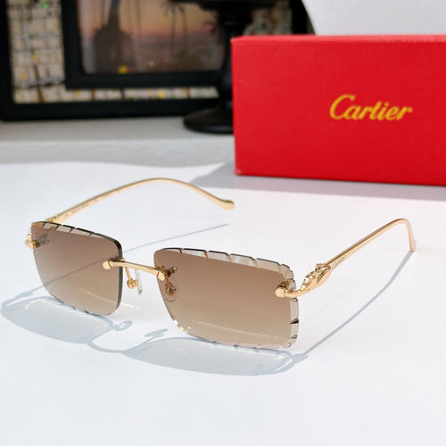 Gold-rimmed cat-eye sunglasses with light beige gradient lenses