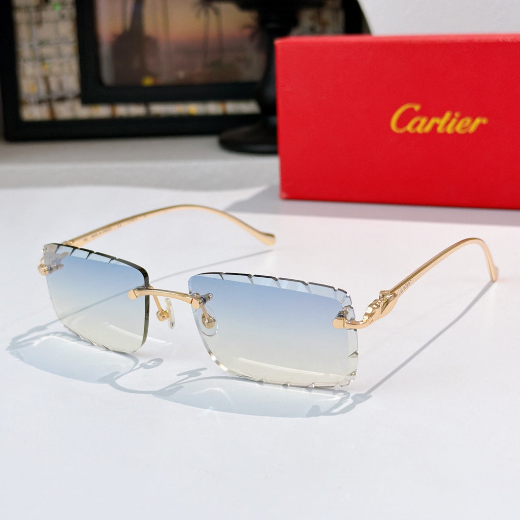 Gold-rimmed cat-eye sunglasses with pale blue gradient lenses
