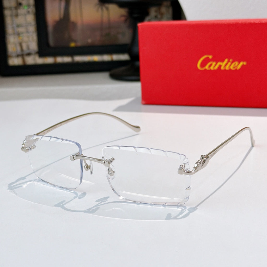 Gold-rimmed cat-eye sunglasses with clear blue lenses