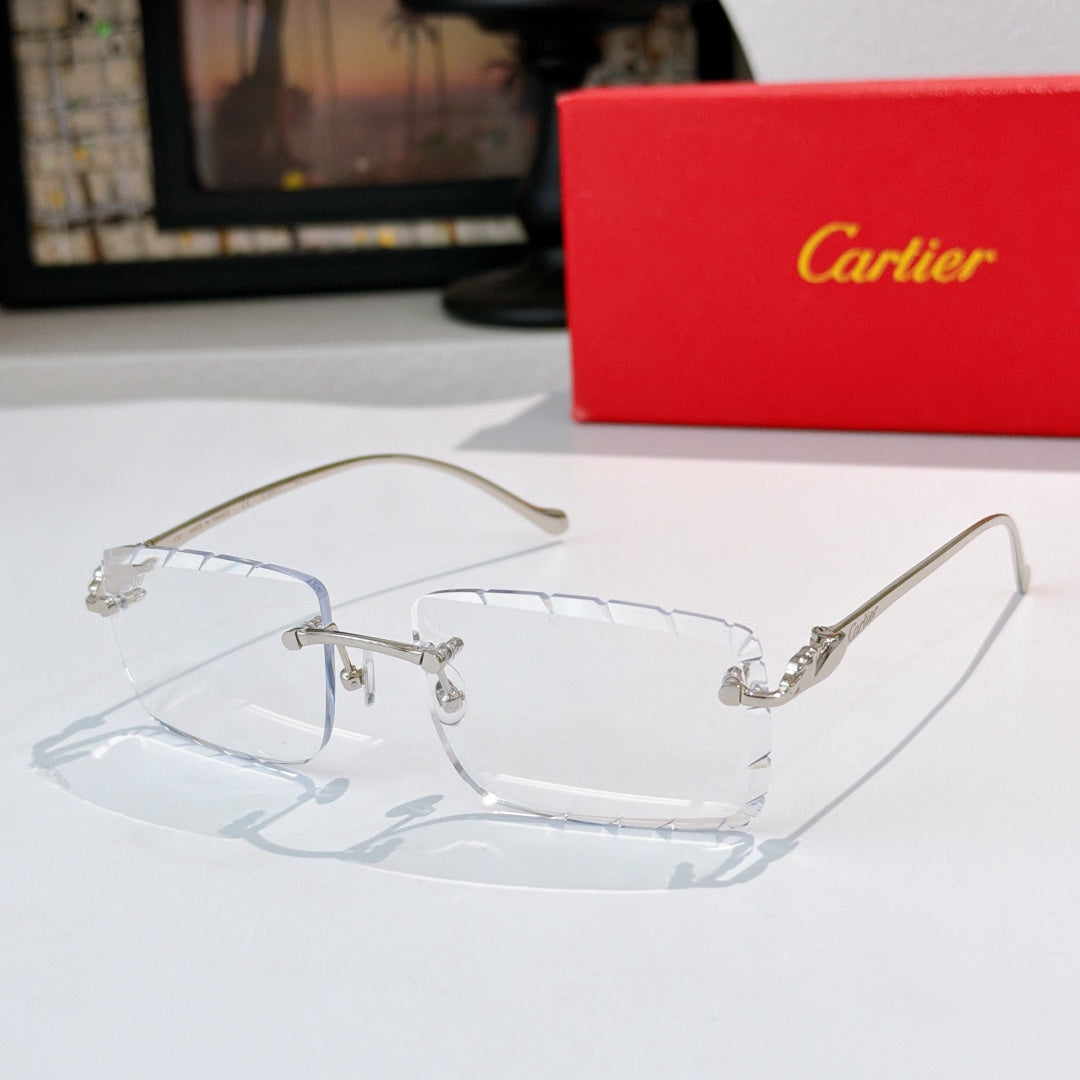Gold-rimmed cat-eye sunglasses with clear blue lenses