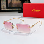 Gold-rimmed cat-eye sunglasses with blush pink gradient lenses
