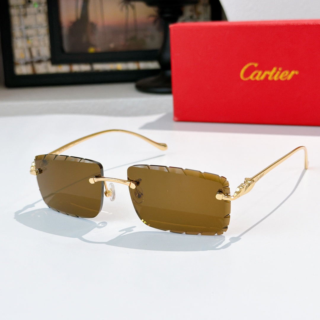 Gold-rimmed cat-eye sunglasses with dark olive gradient lenses