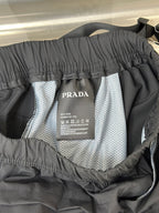 Prada care label inside cargo shorts lining with elastic waistband