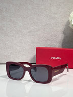 Prada square sunglasses with dark lenses and burgundy frame