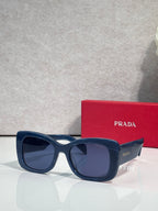 Prada square sunglasses with dark lenses and navy-blue frame