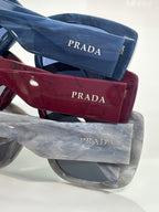 Prada square sunglasses with blue, burgundy, and silver frames