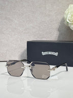 Chrome glasses with gray lenses, black frame, chrome arms with ornate logo detail