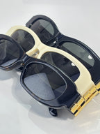 Balenciaga sunglasses two-color set: cream and black oval frames with dark lenses