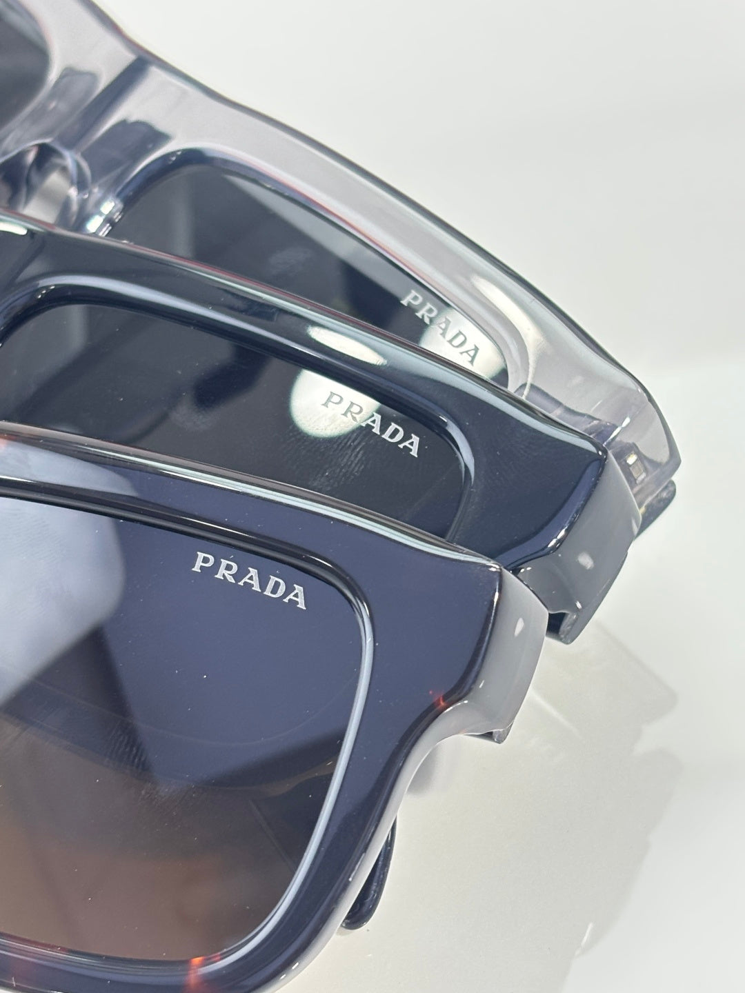 Prada glasses, navy square frames with blue lenses