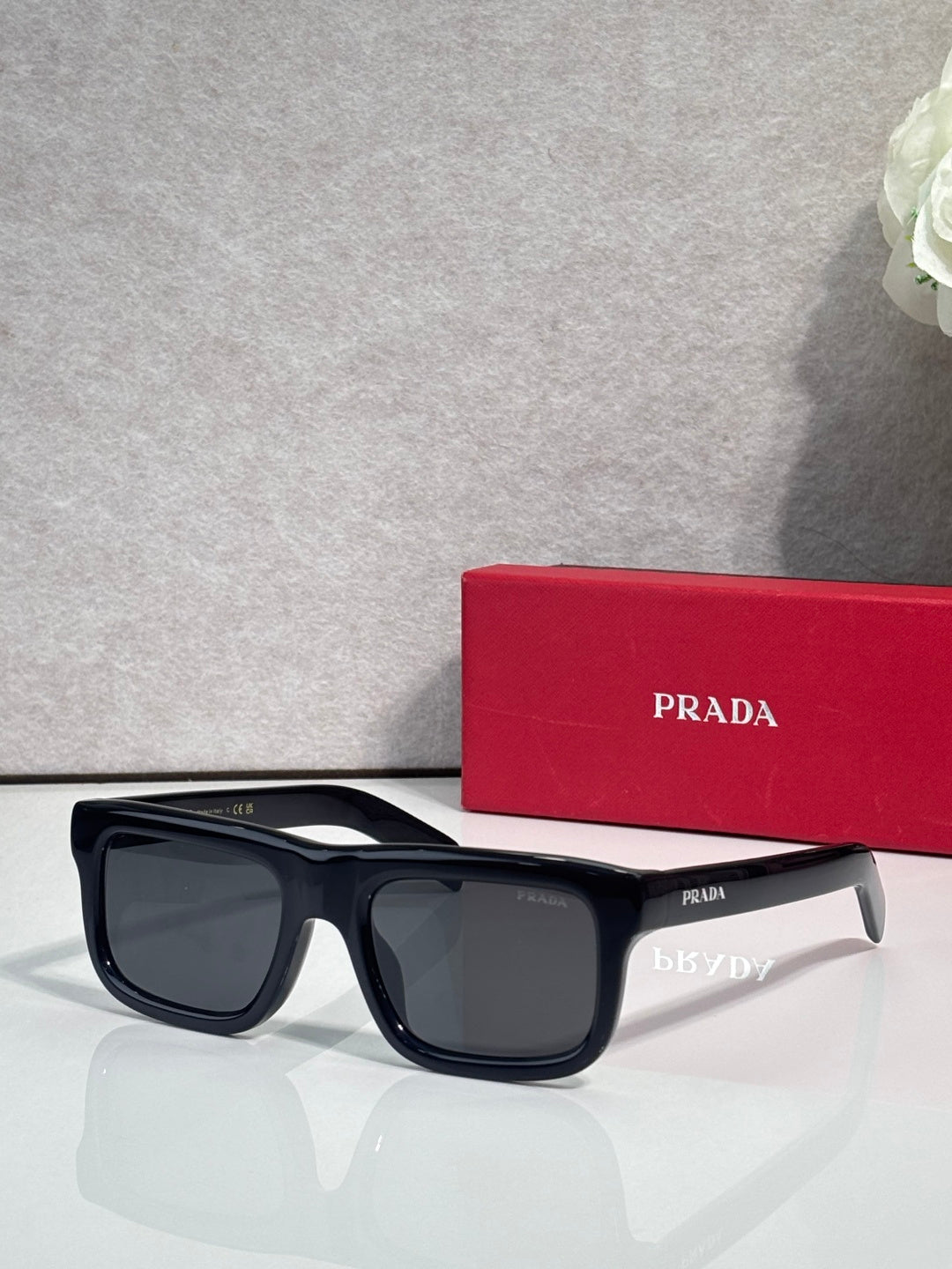 Prada glasses with dark blue frame and dark lenses