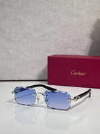 Cartier glasses with black frame, gold accents, clear lenses with blue tint