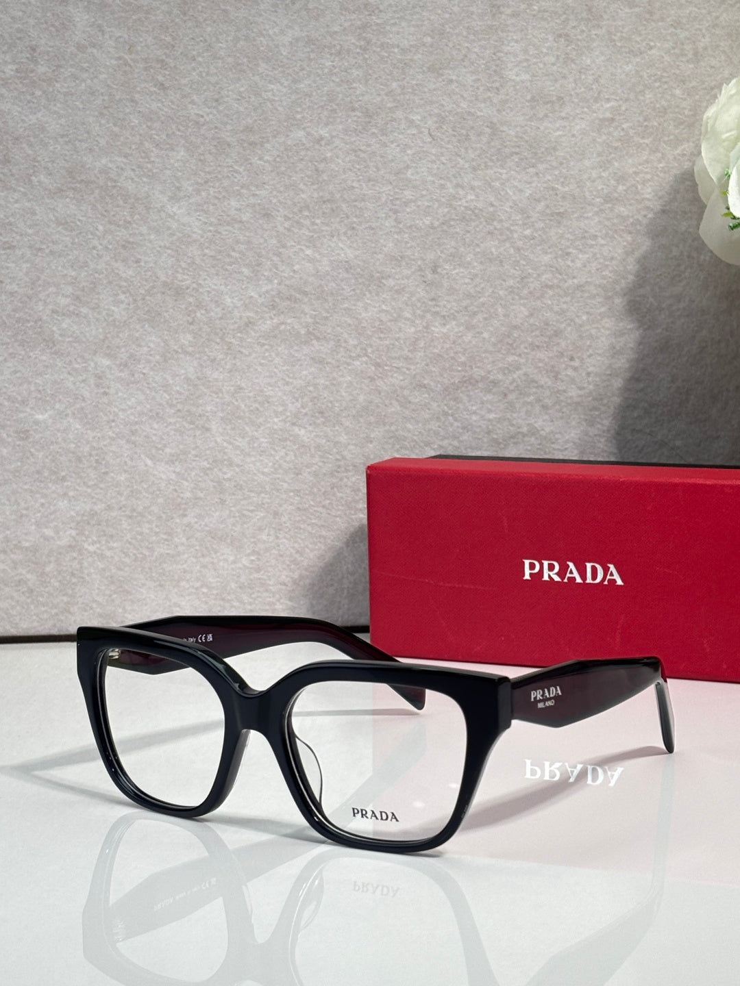 Prada black eyeglasses with full-rim rectangular frames