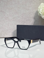 Dior eyeglasses, black acetate frame with gold details at temples, rectangular lenses