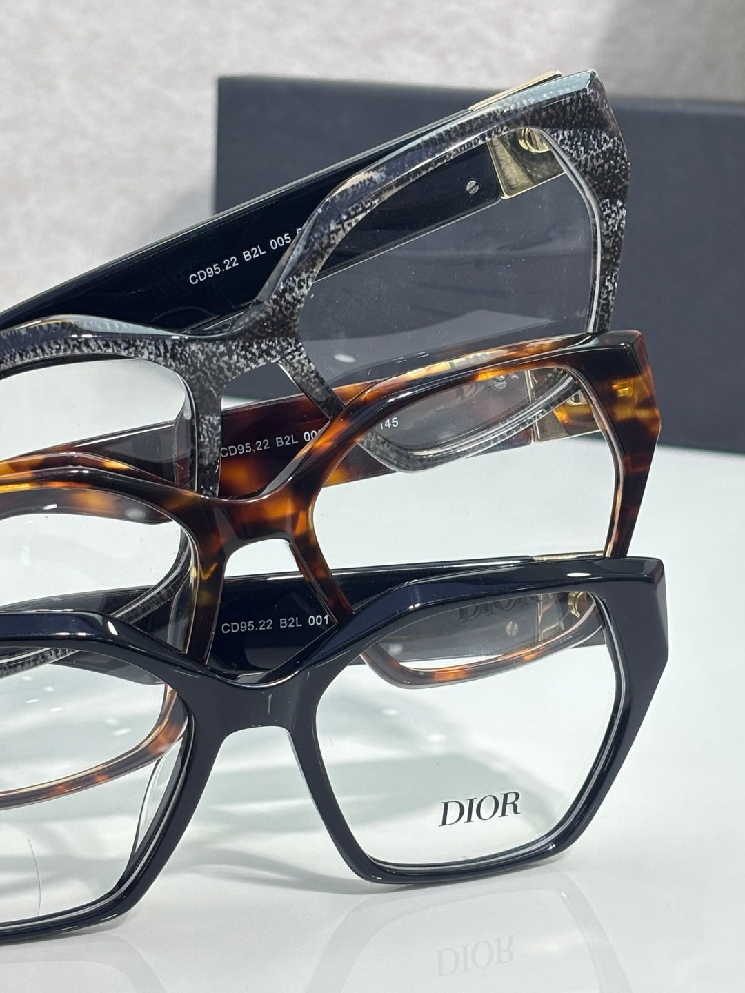Dior eyeglasses, temple close-up with size markings and dark logo accents