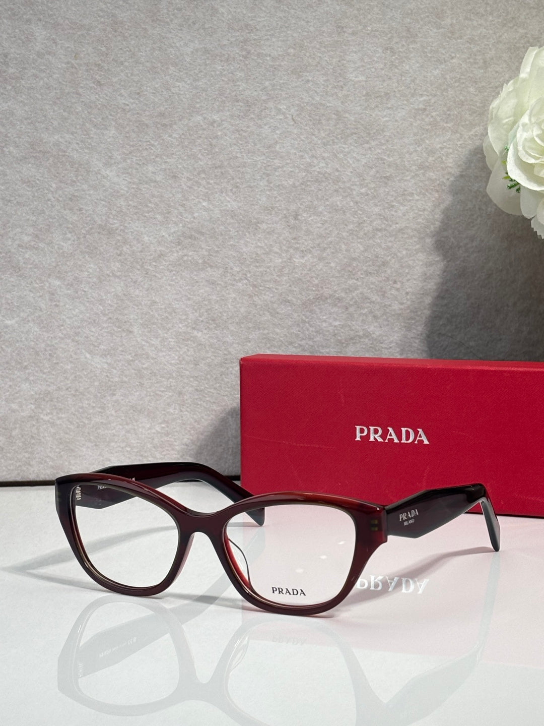 Black Prada eyeglasses with rectangular frames and clear lenses